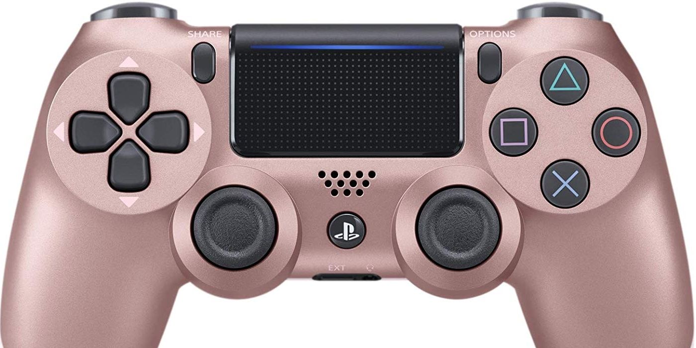 rose gold controller and headset ps4